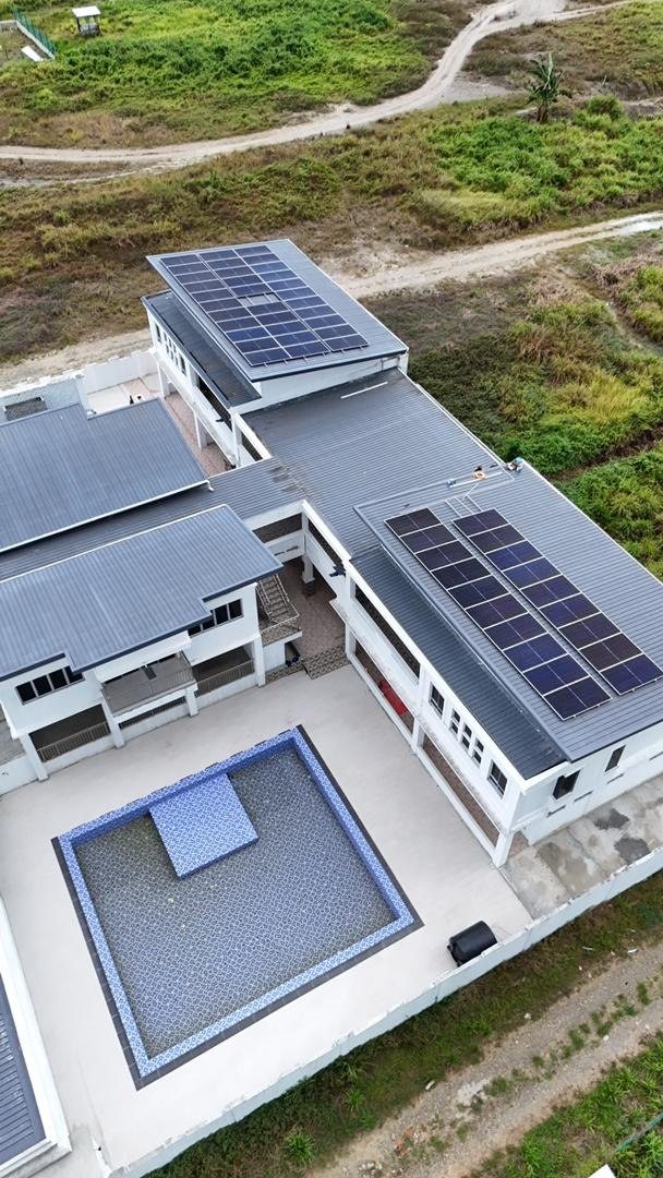 Commercial Villa Resort rooftop solar array aerial view